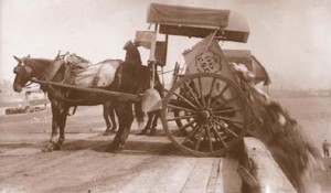 sepia pic of cart tipping